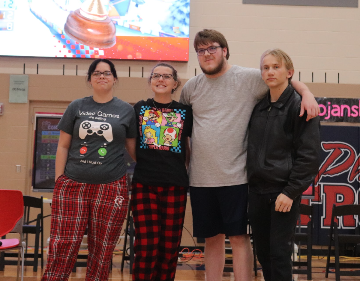 Katherine Offutt (12), Alanna Clontz (12), Connor Shelbourn (12), and Dillon Menke (12) about to play MarioKart on HOCO week.